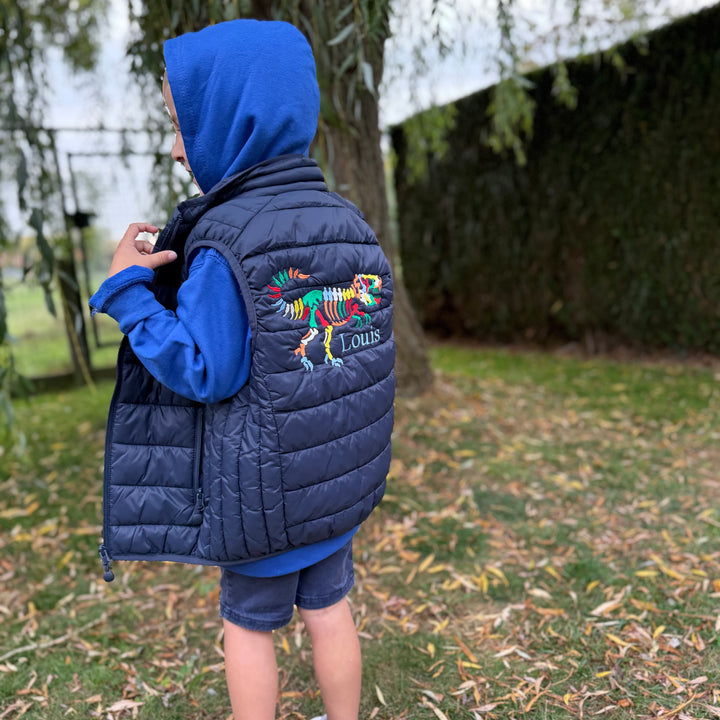 Gepersonaliseerde kinderbodywarmer met dino en naam