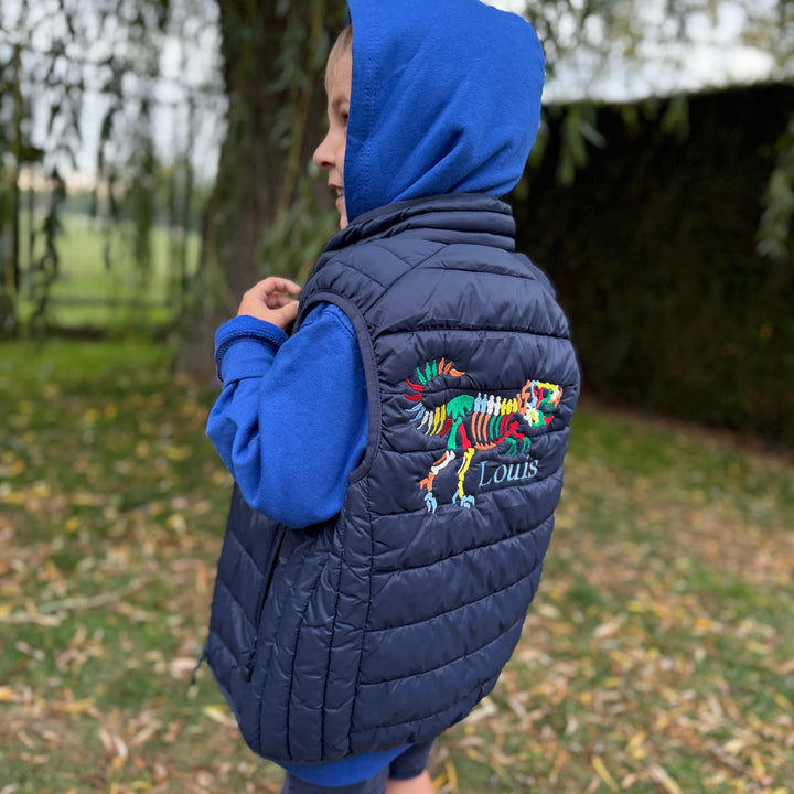 Gepersonaliseerde kinderbodywarmer met dino en naam