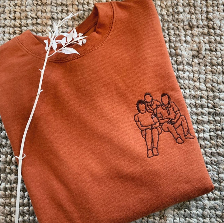 lijntekening op sweater met naam