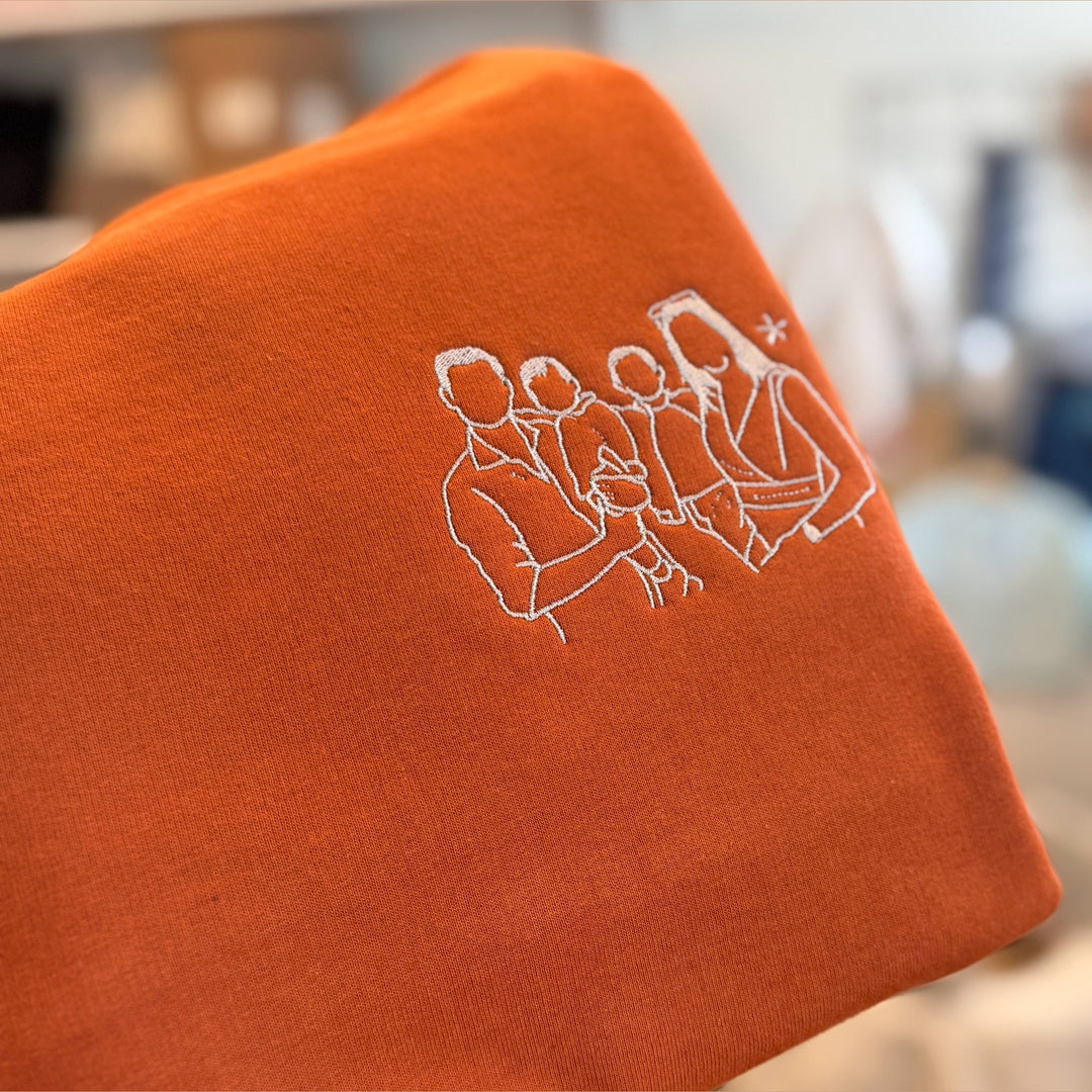 lijntekening op sweater met naam