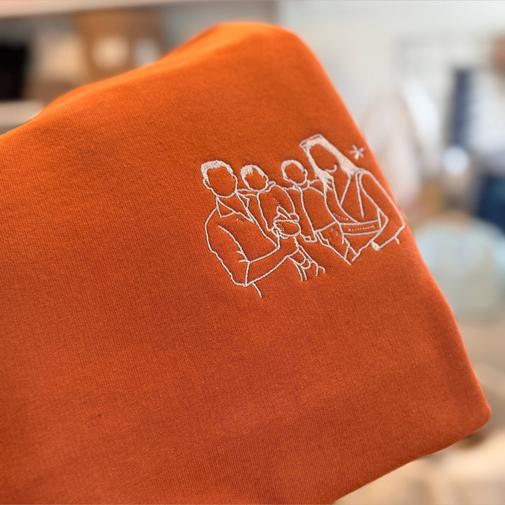 lijntekening op sweater met naam