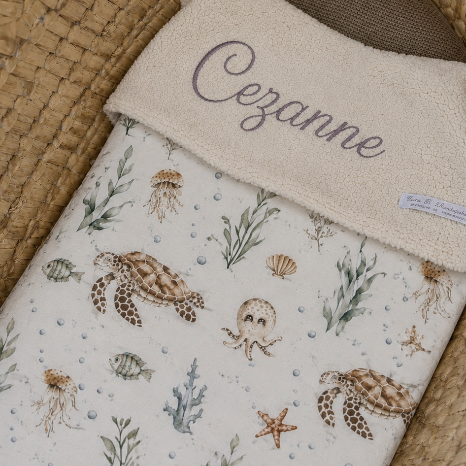 Lichte stof met een speelse print van zeedieren voor een handgemaakt babydeken.