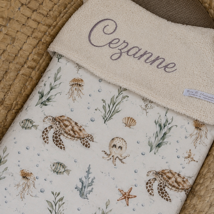 Lichte stof met een speelse print van zeedieren voor een handgemaakt babydeken.