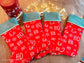 Kerstsok met een geborduurde naam - Gepersonaliseerde kerstsok - gepersonaliseerde kerstcadeau - Caro B Handmade - Merchtem - babywinkel - borduur - Babydeken