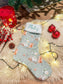 Kerstsok met een geborduurde naam - Gepersonaliseerde kerstsok - gepersonaliseerde kerstcadeau - Caro B Handmade - Merchtem - babywinkel - borduur - Babydeken